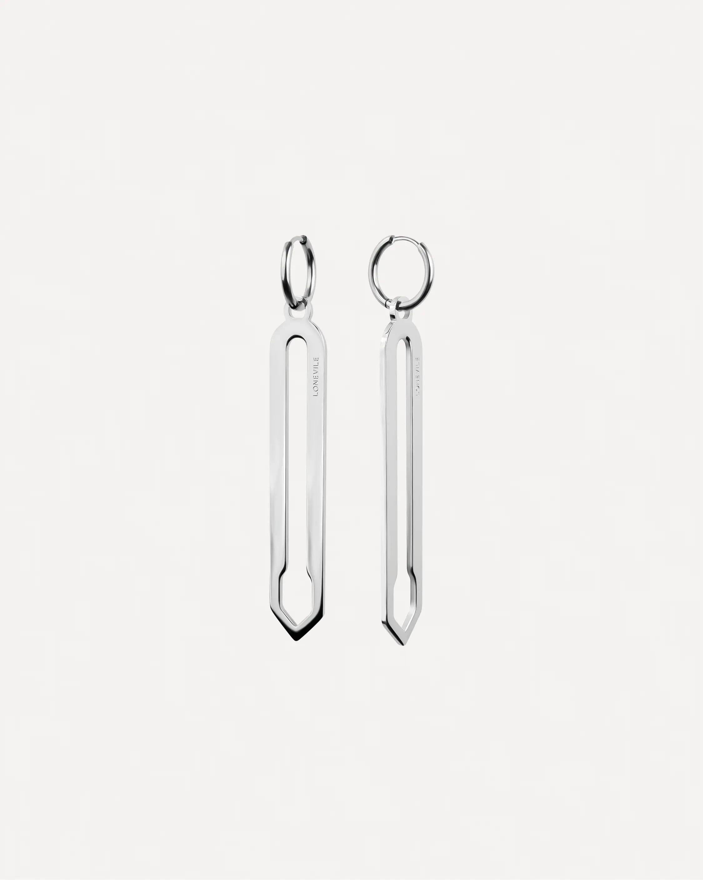 Forma Lamina Ohrringe in Silber aus 316L-Edelstahl, paarweise abgebildet.