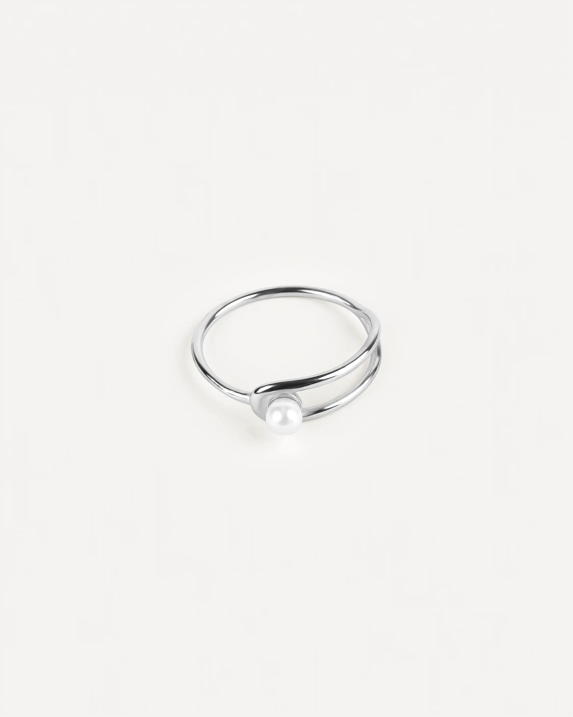 Silberner Éclat Sphère Ring aus 316L-Edelstahl und einer Glasperle, vollständig sichtbar.